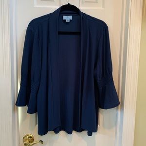 Lightweight cardigan with 3/4 sleeves and subtle bell detail.